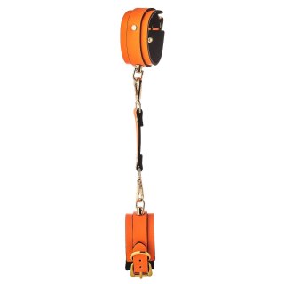 Dream Toys Radiant Handcuff kajdanki świecące w ciemności Orange